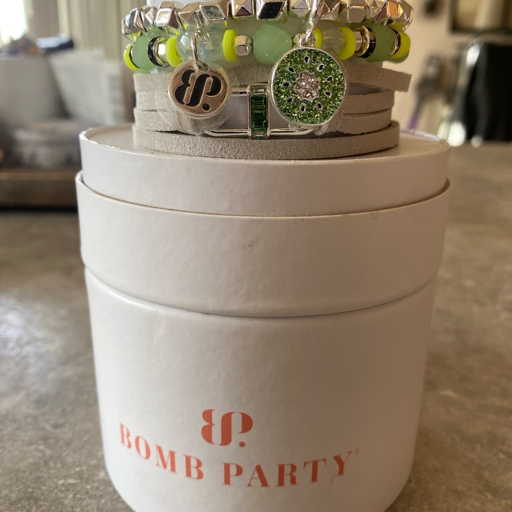 Bomb Party Kiwi stacks bracelets.  3 bracelets, 2 are stretchy.